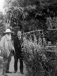 1920 Claude Monet and Gustave Geffroy at Japanese bridge